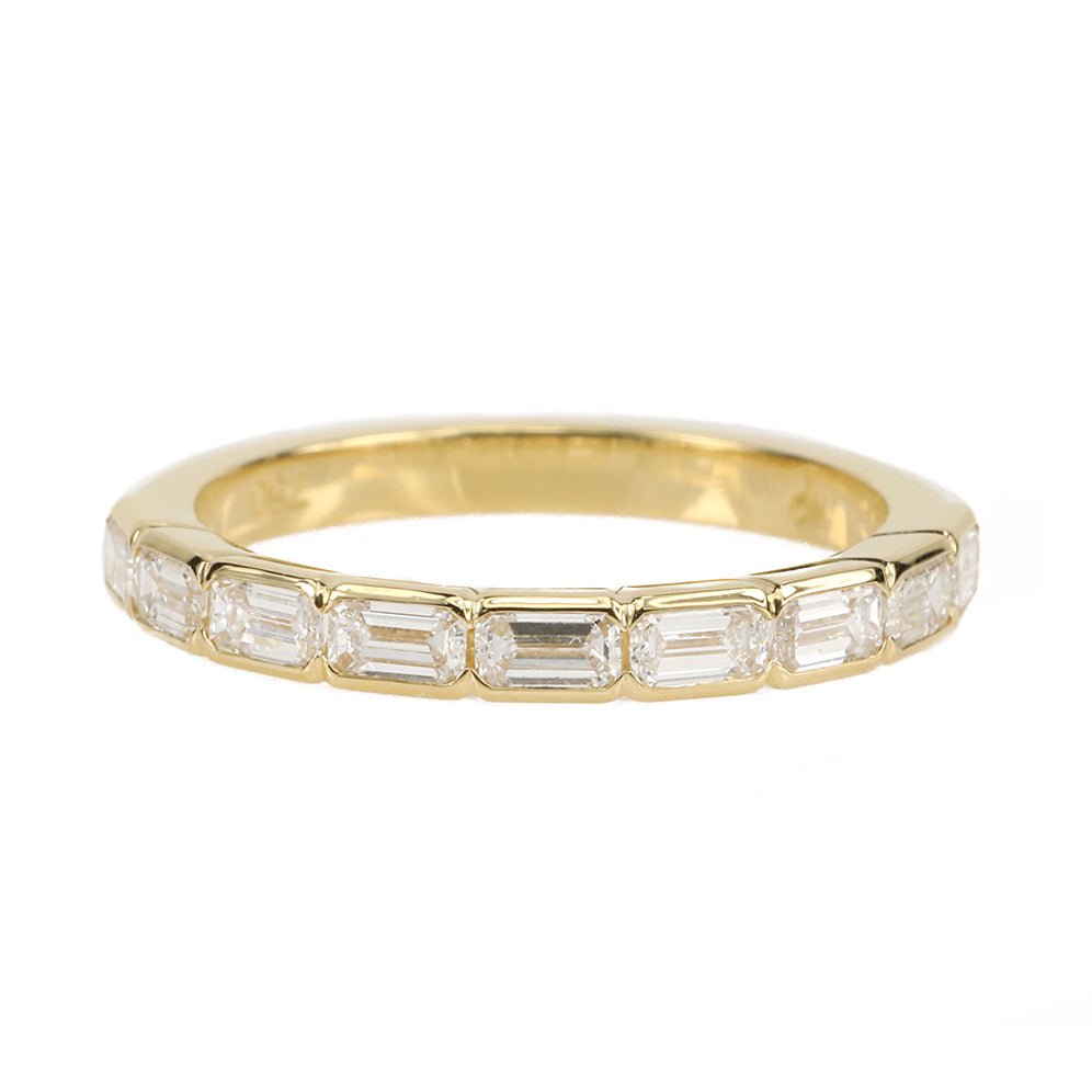 http://www.peridotfinejewelry.com/cdn/shop/products/gold-bezel-set-halfway-emerald-cut-diamond-ring-mark-patterson-peridot-fine-jewelry-231083.jpg?v=1695865634