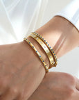 Caroline Ellen Gold Wide Hinged Bangle Bracelet with 18 Star-Set Diamonds